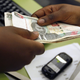 A mobile money transfer via M-Pesa,